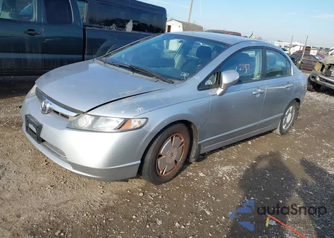 2007 Honda Civic Hybrid from USA, damaged, VIN JHMFA36277S029896